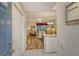 Bright entryway with view into living area and kitchen at 4250 Players Pl # 2615, Sarasota, FL 34238