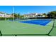 Two well-maintained tennis courts at 4250 Players Pl # 2615, Sarasota, FL 34238