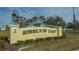 A photo of the Sorrento East community sign and entrance at 429 N Rossetti Dr, Nokomis, FL 34275