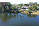 Waterfront property, aerial view showcasing home and dock at 4515 Falcon Ridge Dr, Sarasota, FL 34233