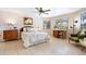 Spacious bedroom with ceiling fan, built-in desk, and ample space at 4515 Falcon Ridge Dr, Sarasota, FL 34233