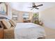 Serene bedroom features a ceiling fan and plenty of natural light at 4515 Falcon Ridge Dr, Sarasota, FL 34233