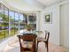 Charming breakfast nook boasts water views and seating for two at 4515 Falcon Ridge Dr, Sarasota, FL 34233