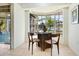 Cozy dining area with bay window offering garden views at 4515 Falcon Ridge Dr, Sarasota, FL 34233