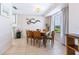 Bright dining area with wood table and chairs at 4515 Falcon Ridge Dr, Sarasota, FL 34233