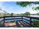 Enjoy peaceful lake views from this dock at 4515 Falcon Ridge Dr, Sarasota, FL 34233