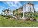 Ground-level view of condo building showcasing a unit's patio at 452 Cerromar Rd # 176, Venice, FL 34293