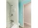 Simple bathroom with shower/tub and white tile at 4822 30Th Street E Ct, Bradenton, FL 34203