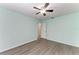 Bedroom with ceiling fan and gray flooring at 4822 30Th Street E Ct, Bradenton, FL 34203