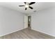 Bedroom with ceiling fan and gray flooring at 4822 30Th Street E Ct, Bradenton, FL 34203