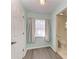 Bedroom with ceiling fan and gray flooring at 4822 30Th Street E Ct, Bradenton, FL 34203