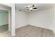 Bedroom with ceiling fan and gray flooring at 4822 30Th Street E Ct, Bradenton, FL 34203