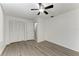 Bedroom with ceiling fan and gray flooring at 4822 30Th Street E Ct, Bradenton, FL 34203