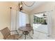 Bright breakfast nook with pool view and sliding glass doors at 4822 30Th Street E Ct, Bradenton, FL 34203