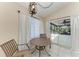 Bright breakfast nook with pool view and sliding glass doors at 4822 30Th Street E Ct, Bradenton, FL 34203