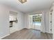 Dining room with sliding glass doors leading to pool at 4822 30Th Street E Ct, Bradenton, FL 34203