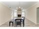 Dining room with a table, bench, and chandelier at 4822 30Th Street E Ct, Bradenton, FL 34203