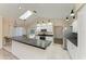 Modern kitchen featuring stainless steel appliances and an island at 4822 30Th Street E Ct, Bradenton, FL 34203