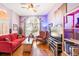 Relaxing living room with hardwood floors and comfortable seating at 4850 Sweetshade Dr, Sarasota, FL 34241