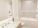 Modern bathroom with a bathtub and double sinks at 4950 Remington Dr # 208, Sarasota, FL 34234