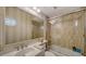 Bathroom with a tub/shower combo and sink at 5208 Parisienne Pl # 202B33, Sarasota, FL 34238