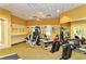 Well-equipped gym featuring strength training machines and mirrored walls for a complete workout experience at 5208 Parisienne Pl # 202B33, Sarasota, FL 34238