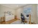 Well-lit home office featuring a white cabinet and modern desk, perfect for a productive workspace at 5208 Parisienne Pl # 202B33, Sarasota, FL 34238