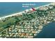 Aerial view showcasing community, beach access, and waterways at 521 Wedge Ln, Longboat Key, FL 34228