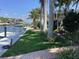 Private backyard with canal access and boat dock at 521 Wedge Ln, Longboat Key, FL 34228