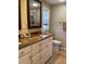 Double vanity bathroom with granite countertops at 521 Wedge Ln, Longboat Key, FL 34228