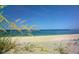 Relaxing beach view with pristine sand and clear water at 521 Wedge Ln, Longboat Key, FL 34228