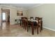 Formal dining room featuring a wood table and chairs at 521 Wedge Ln, Longboat Key, FL 34228