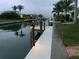 Private dock with lighting, perfect for enjoying waterfront living at 521 Wedge Ln, Longboat Key, FL 34228