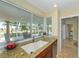 Kitchen with granite countertops and a view of the pool at 521 Wedge Ln, Longboat Key, FL 34228