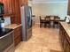 Kitchen features granite counters and stainless steel appliances at 521 Wedge Ln, Longboat Key, FL 34228