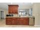 Kitchen boasts granite countertops and stainless steel appliances at 521 Wedge Ln, Longboat Key, FL 34228