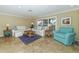 Light and airy living room with sectional sofa and large windows at 521 Wedge Ln, Longboat Key, FL 34228