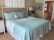 Spacious main bedroom with a large bed and ensuite bathroom at 521 Wedge Ln, Longboat Key, FL 34228