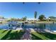 Backyard oasis with canal access and private dock at 521 Wedge Ln, Longboat Key, FL 34228