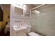 Bathroom with shower, sink, and toilet at 5415 8Th Avenue W Dr, Bradenton, FL 34209