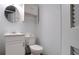 Small bathroom with toilet and sink at 5415 8Th Avenue W Dr, Bradenton, FL 34209