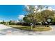 Ranch style home with a large front yard and mature trees at 5415 8Th Avenue W Dr, Bradenton, FL 34209