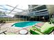 Relaxing pool area with covered patio and comfortable seating at 5415 8Th Avenue W Dr, Bradenton, FL 34209