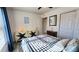 Bedroom with two dressers and a queen bed at 5940 7Th W Ave # 5940, Bradenton, FL 34209