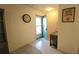 Bright entryway with teal door and tiled floor at 5940 7Th W Ave # 5940, Bradenton, FL 34209