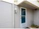 Condo entrance with light fixture and address number at 5940 7Th W Ave # 5940, Bradenton, FL 34209