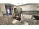 Modern kitchen with stainless steel appliances and granite counters at 5940 7Th W Ave # 5940, Bradenton, FL 34209