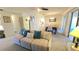 Cozy living room featuring a sofa and view of dining area at 5940 7Th W Ave # 5940, Bradenton, FL 34209