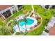 Aerial view of a community pool with surrounding landscaping at 5940 7Th W Ave # 5940, Bradenton, FL 34209