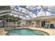 Relaxing pool and patio area with lounge chairs at 6115 39Th W Ave, Bradenton, FL 34209